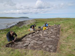 Excavation of  the Iron Age Mound at Swandro