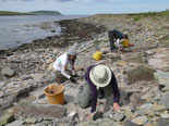 Excavation at the new Late Bronze Age site emerging from the beach at Swandro