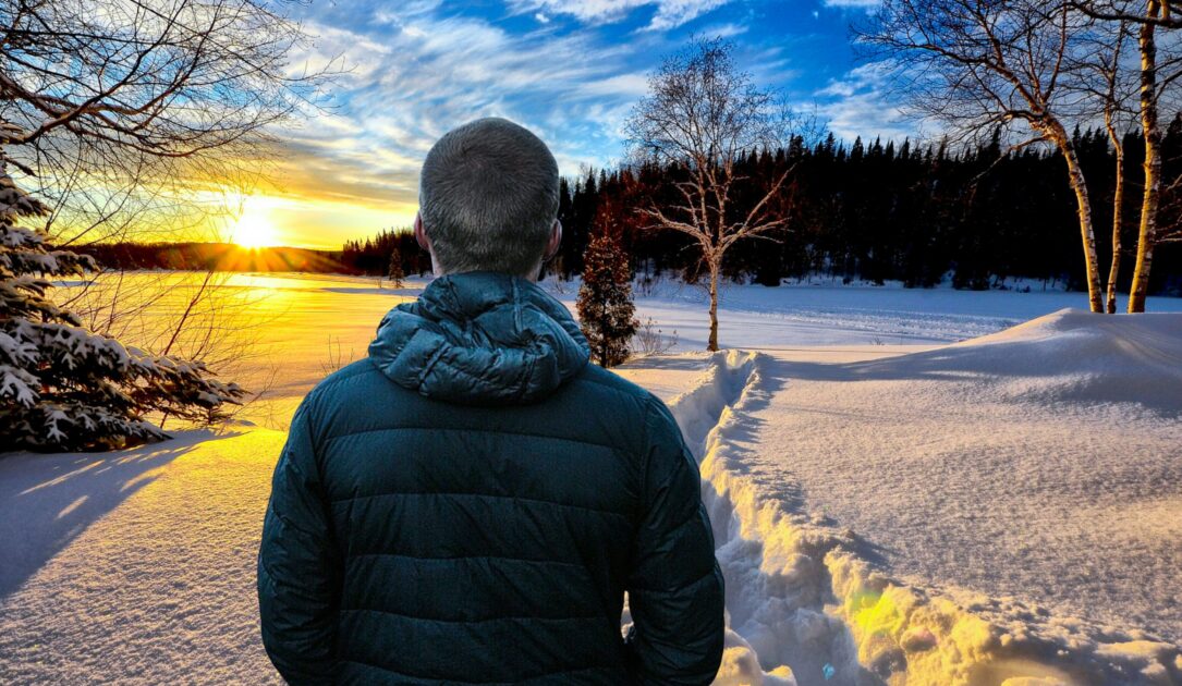 Man watching a snowy landscape
