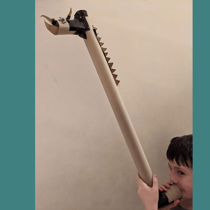 Photo of boy with a model carnyx